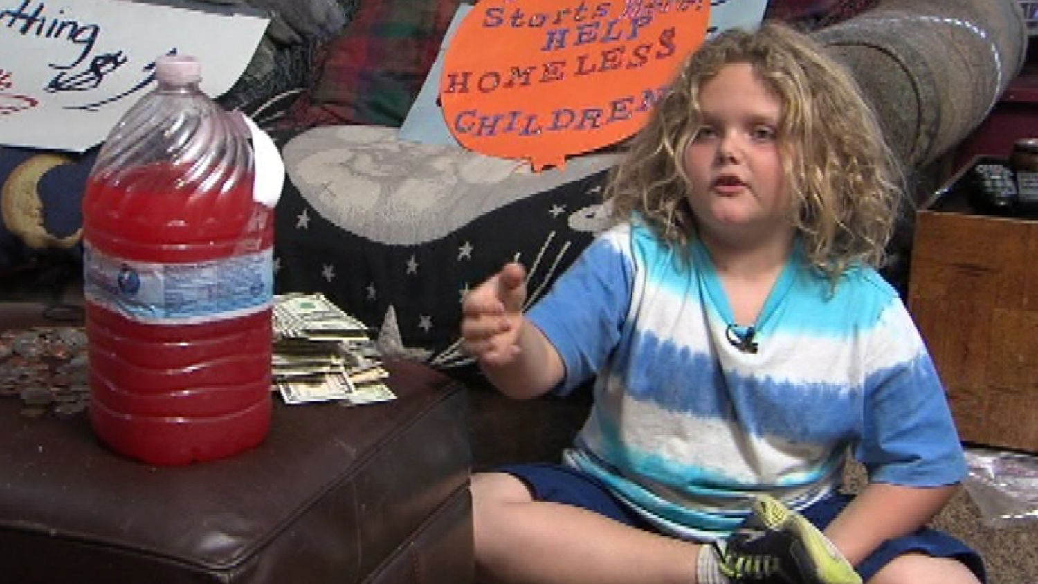 8-year-old opens up Kool Aid stand to help homeless